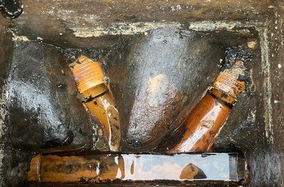 Open inspection chamber with clay pipes