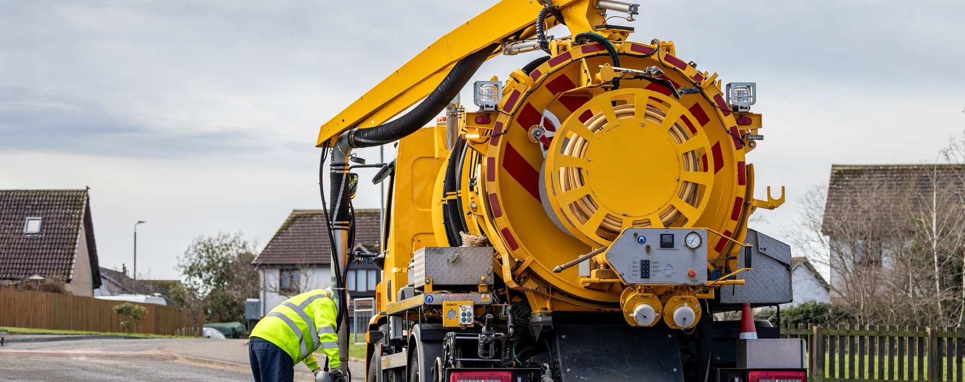 Drain jetting unit working on a residential street
